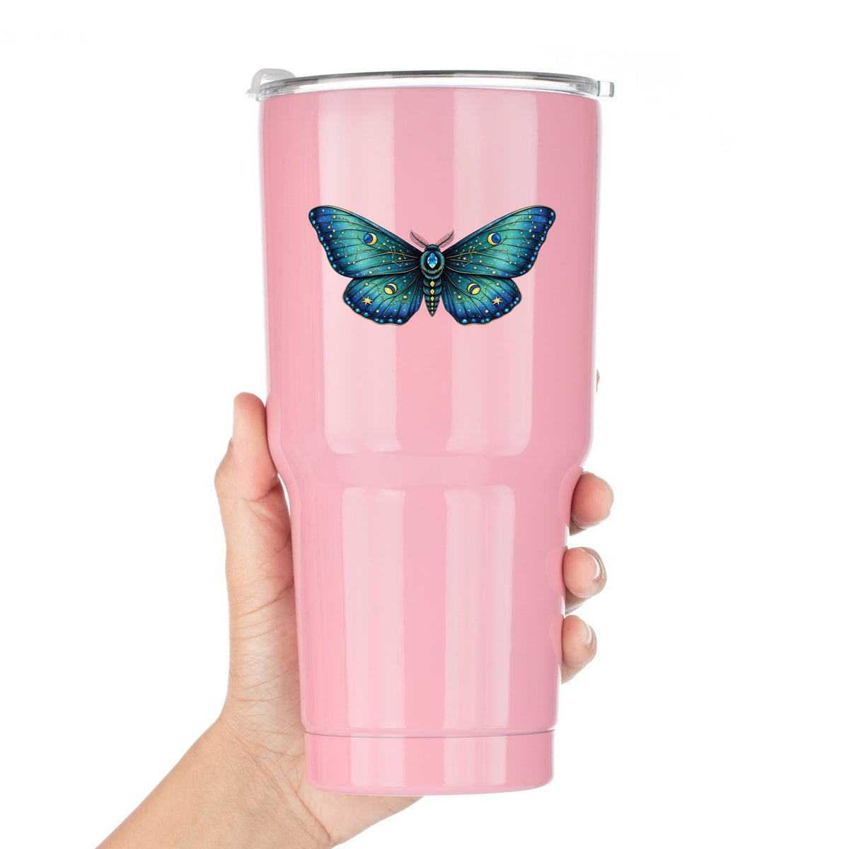 Teal Celestial Moth UV DTF sticker applied to a pink tumbler held against a white background