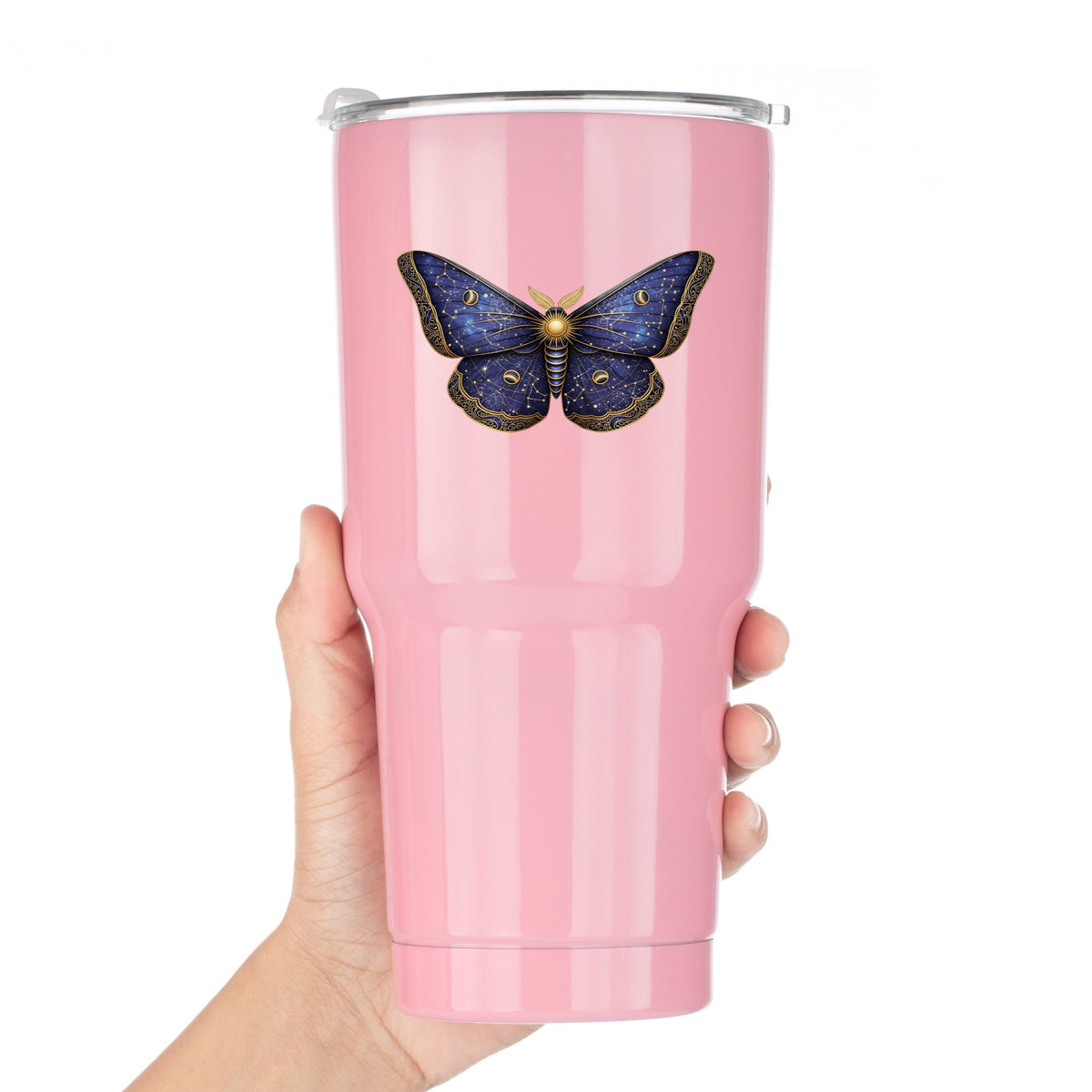 Navy Constellation Moth UV DTF sticker applied to a pink tumbler held against a white background