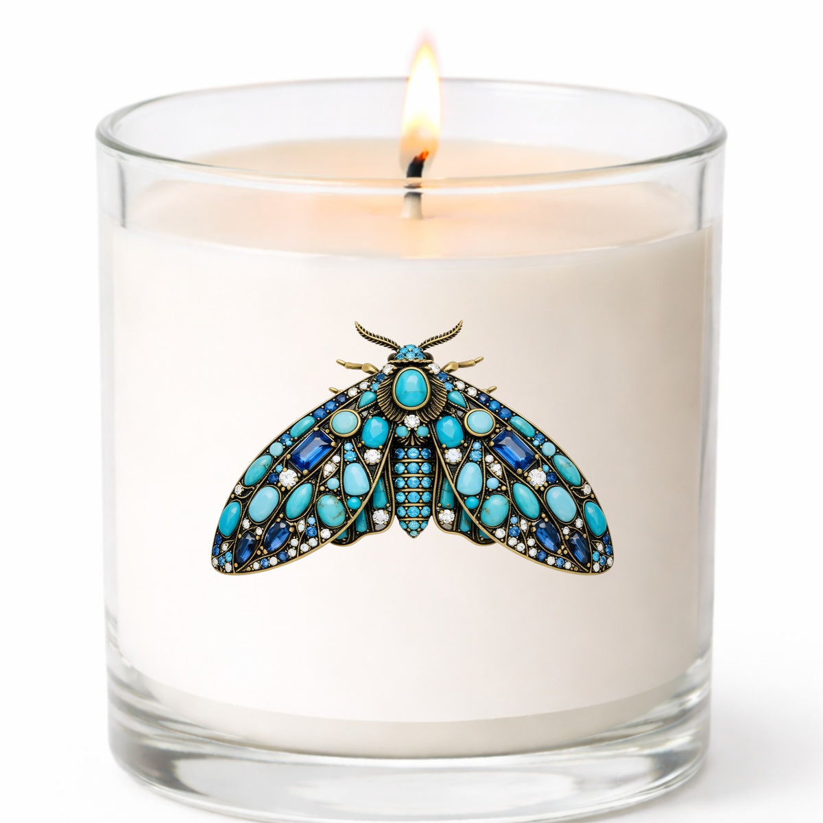 Turquoise Jeweled Moth UV DTF sticker applied to a white candle in a clear glass jar