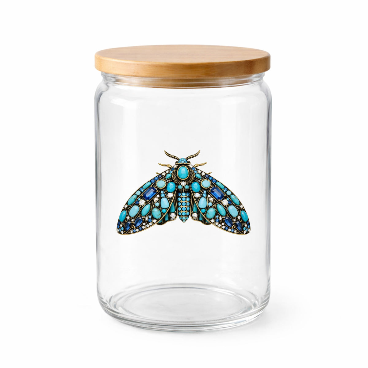 Turquoise Jeweled Moth UV DTF sticker applied to a clear glass jar with a wooden lid