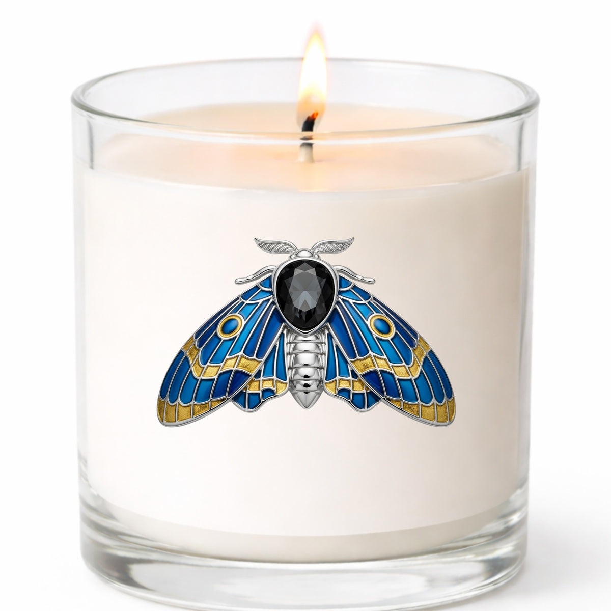 Silver Blue Enamel Moth UV DTF sticker applied to a white candle in a clear glass jar