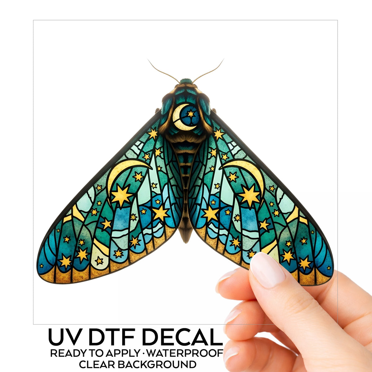 Stained Glass Moon Moth UV DTF sticker on its backing card, held in hand
