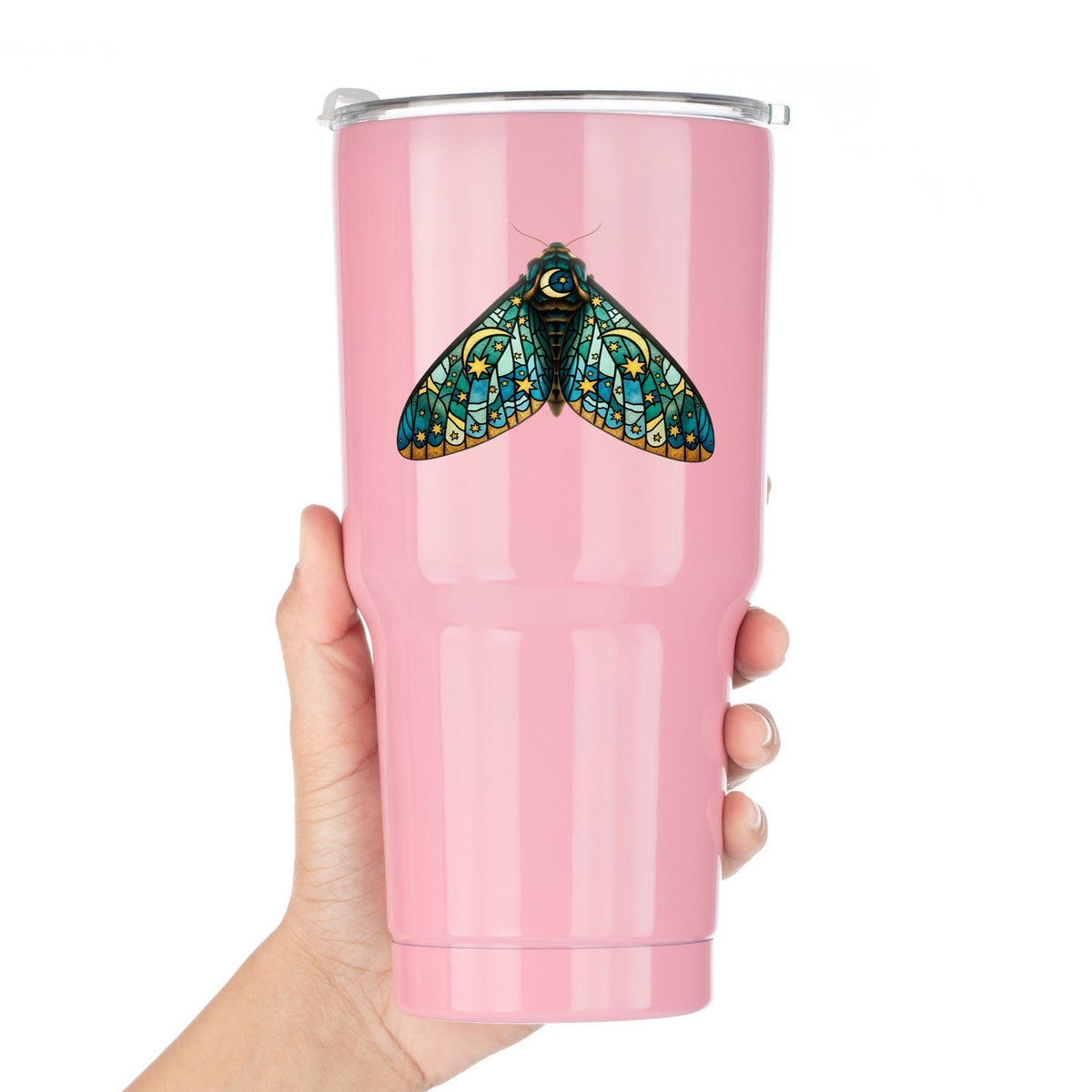 Stained Glass Moon Moth UV DTF sticker applied to a pink tumbler held against a white background