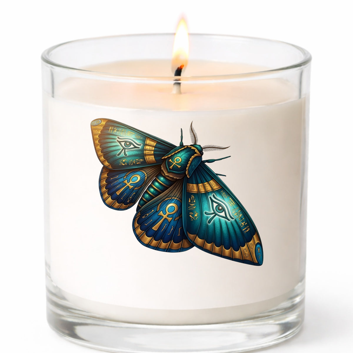Egyptian Eye Of Horus Moth UV DTF sticker applied to a white candle in a clear glass jar