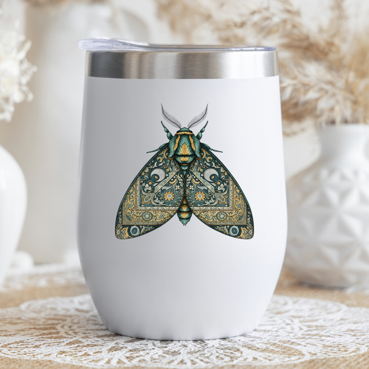 Green Damask Moth UV DTF sticker applied to a white stemless tumbler with a lid