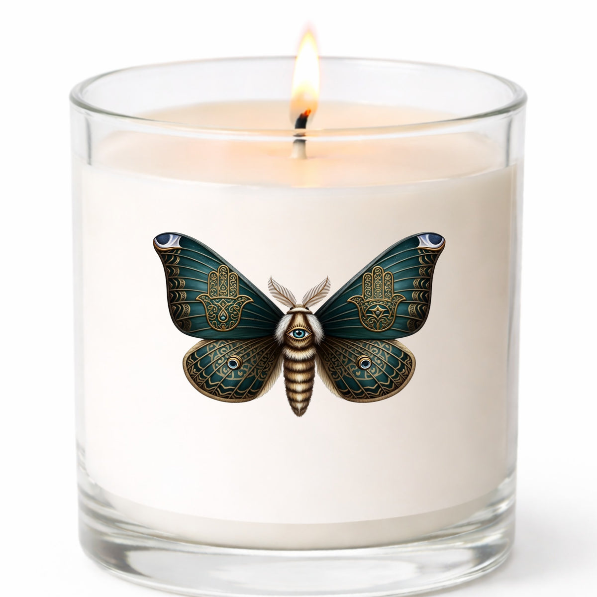 Hamsa Hand Moth UV DTF sticker applied to a white candle in a clear glass jar