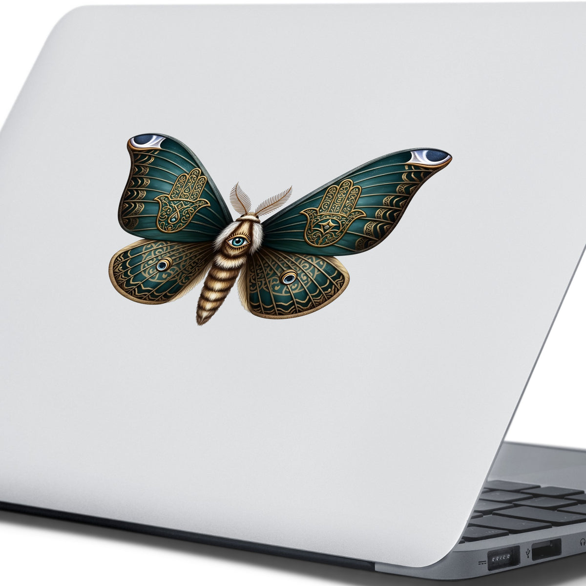 Hamsa Hand Moth UV DTF sticker applied to the lid of a silver laptop