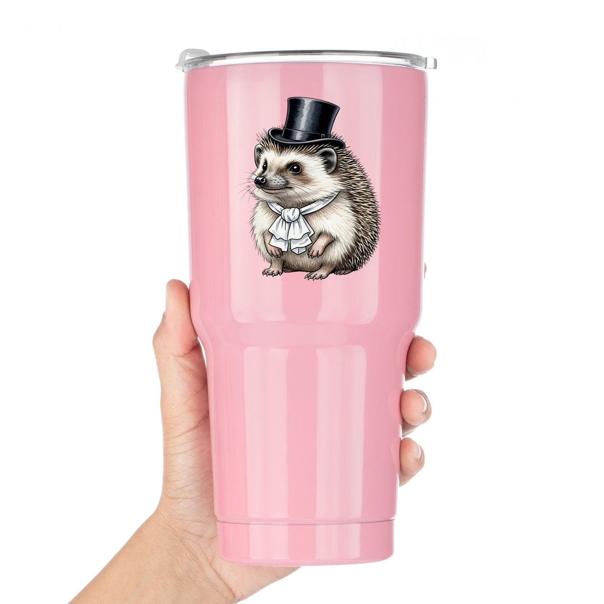 Hedgehog In Top Hat UV DTF sticker applied to a pink tumbler held against a white background