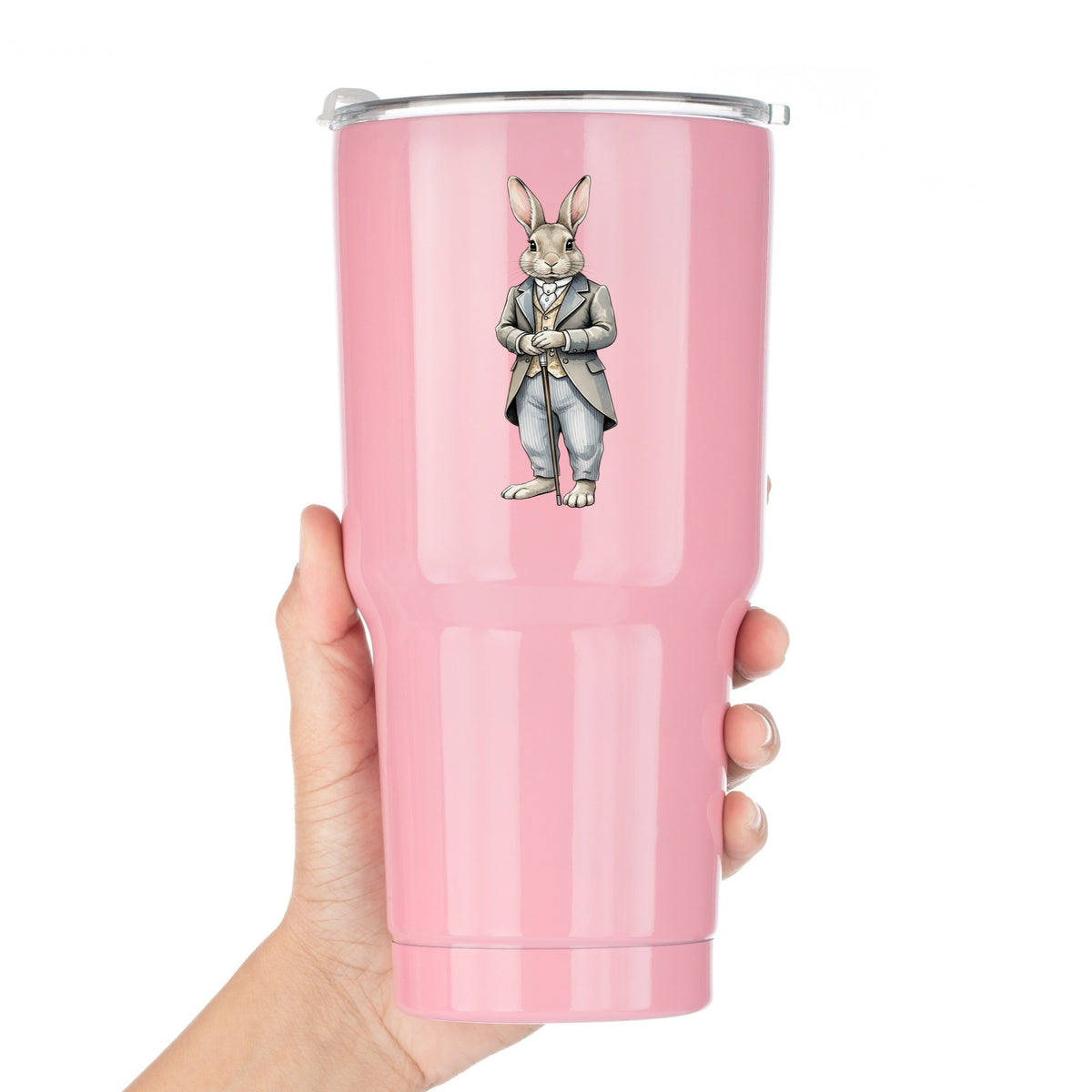Gray Bunny Victorian Suit Cane UV DTF sticker applied to a pink tumbler held against a white background