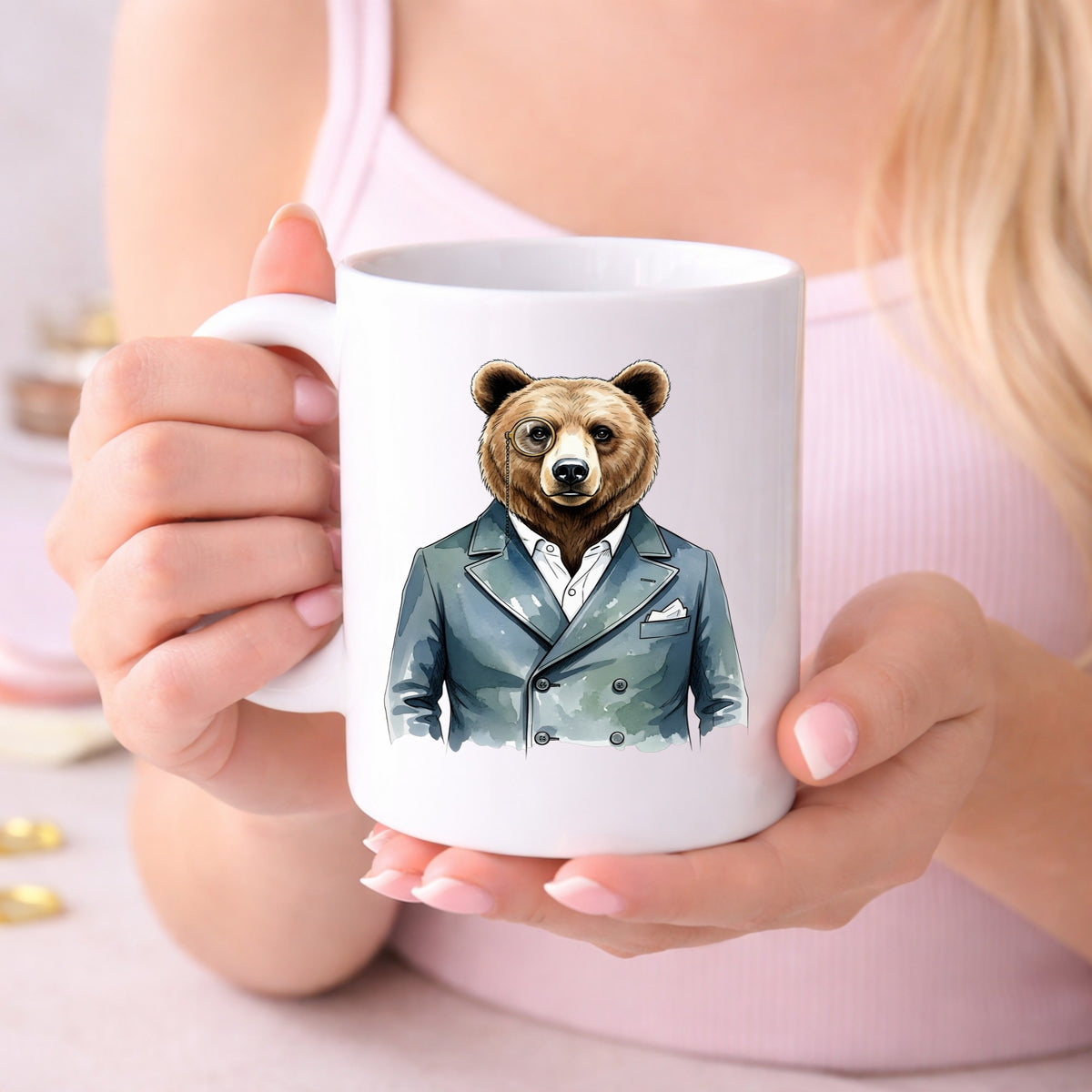 Bear With Monocle Blue Suit UV DTF sticker applied to a white coffee mug held in both hands