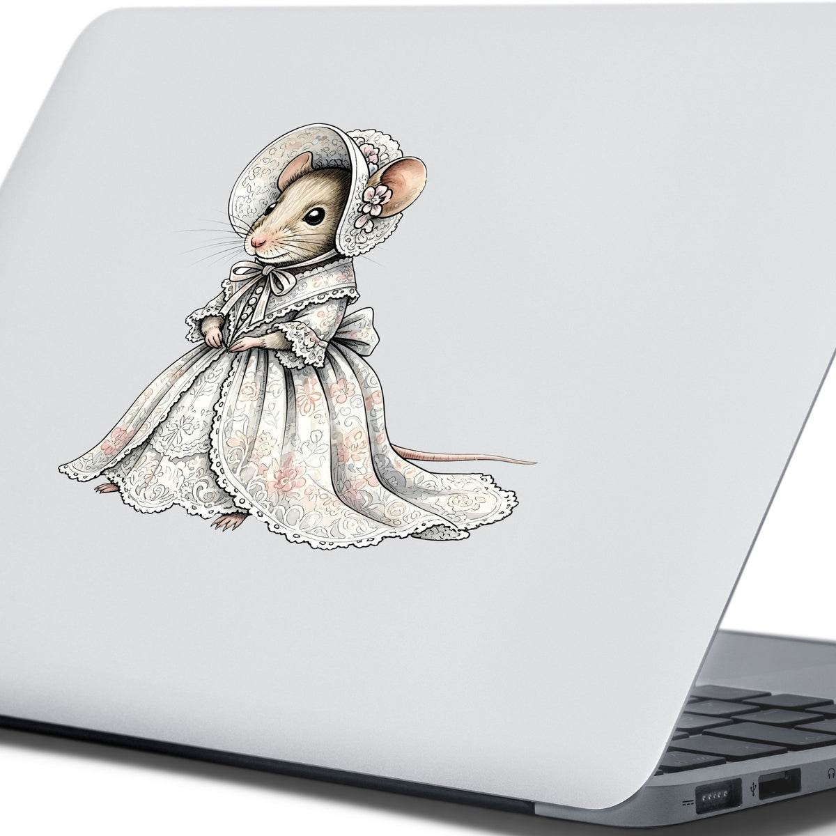 Mouse In Lace Bonnet Dress UV DTF sticker applied to the lid of a silver laptop