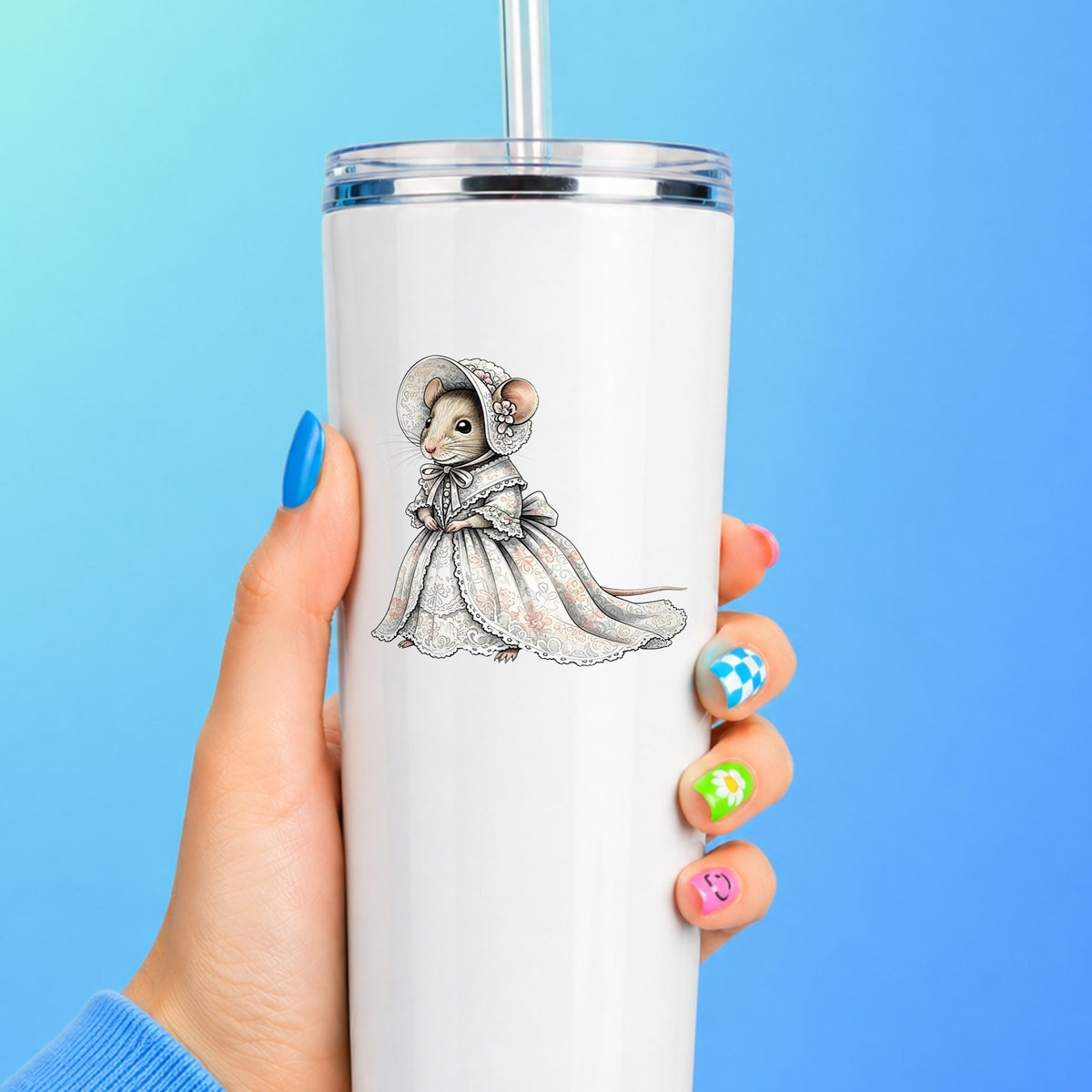 Mouse In Lace Bonnet Dress UV DTF sticker applied to a white straw tumbler on a blue background