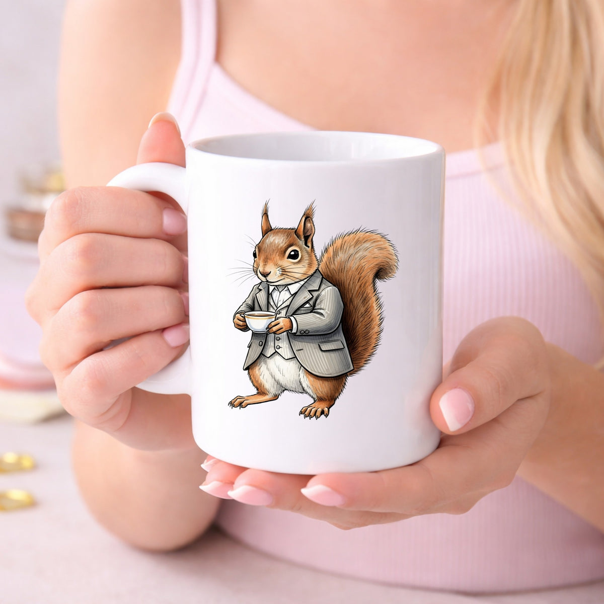 Red Squirrel Holding Teacup UV DTF sticker applied to a white coffee mug held in both hands