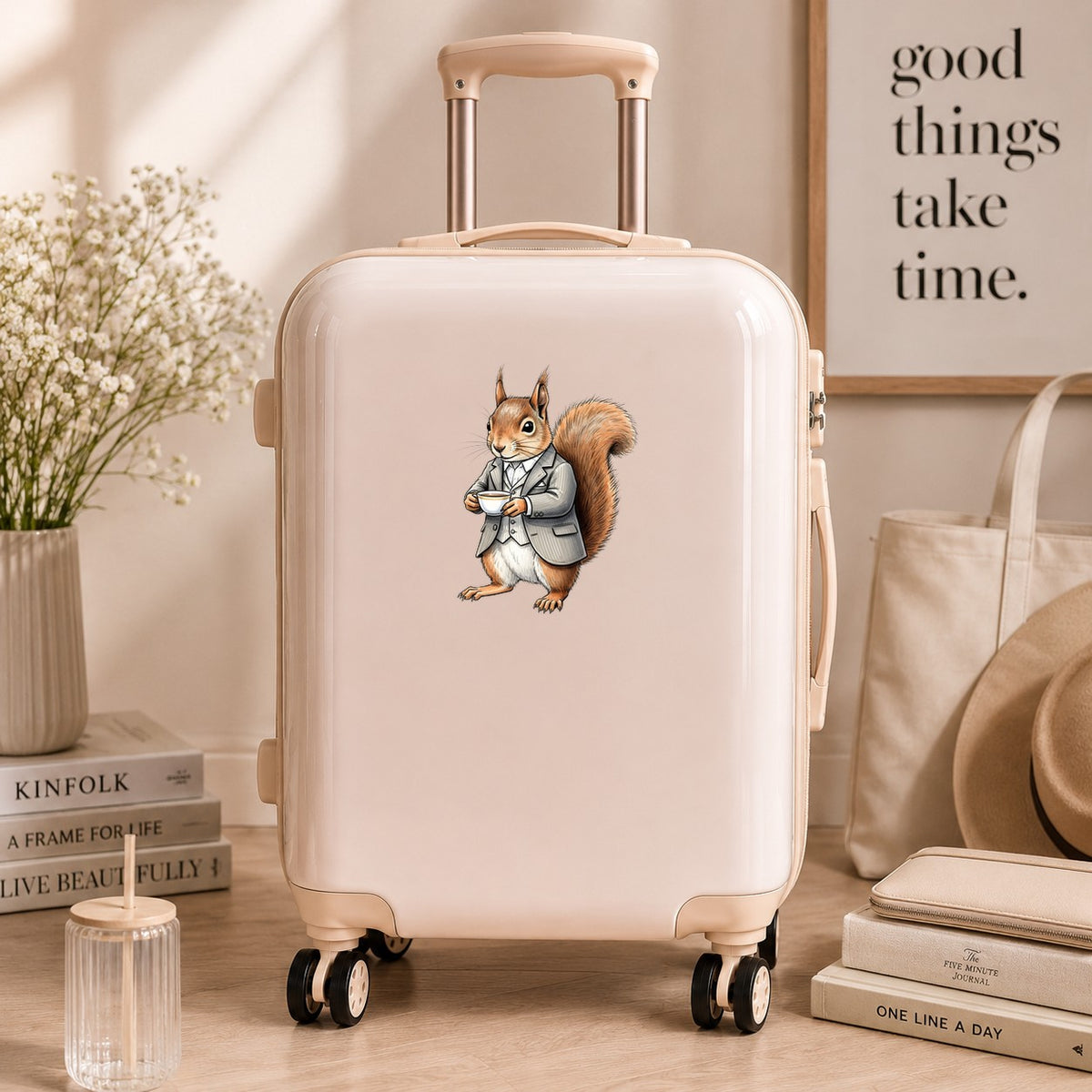 Red Squirrel Holding Teacup UV DTF sticker applied to a cream carry-on suitcase