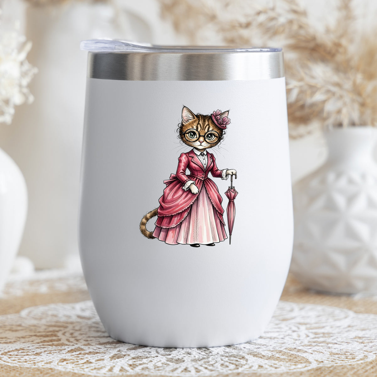 Tabby Cat Pink Victorian Dress UV DTF sticker applied to a white stemless tumbler with a lid