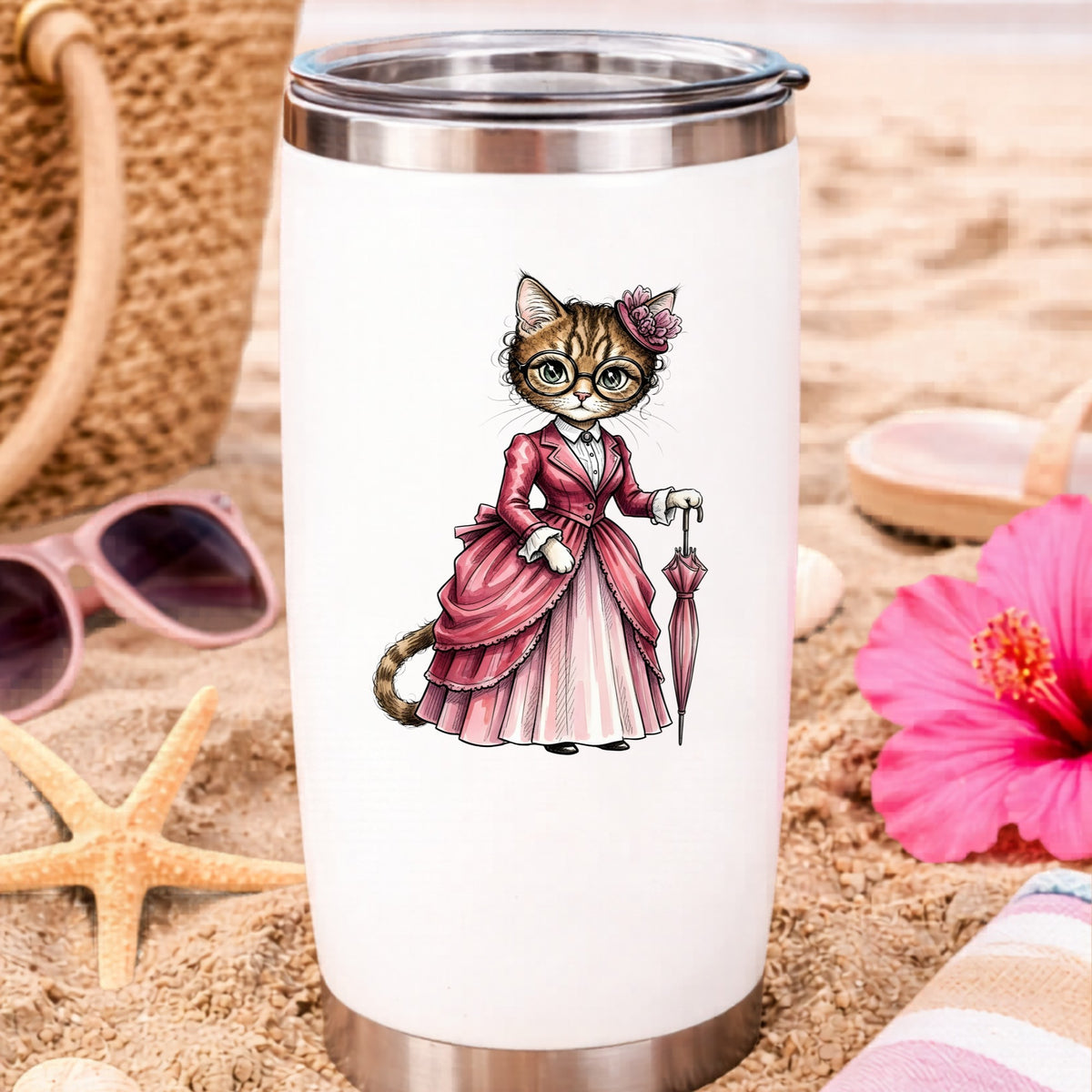 Tabby Cat Pink Victorian Dress UV DTF sticker applied to a white travel tumbler on beach sand