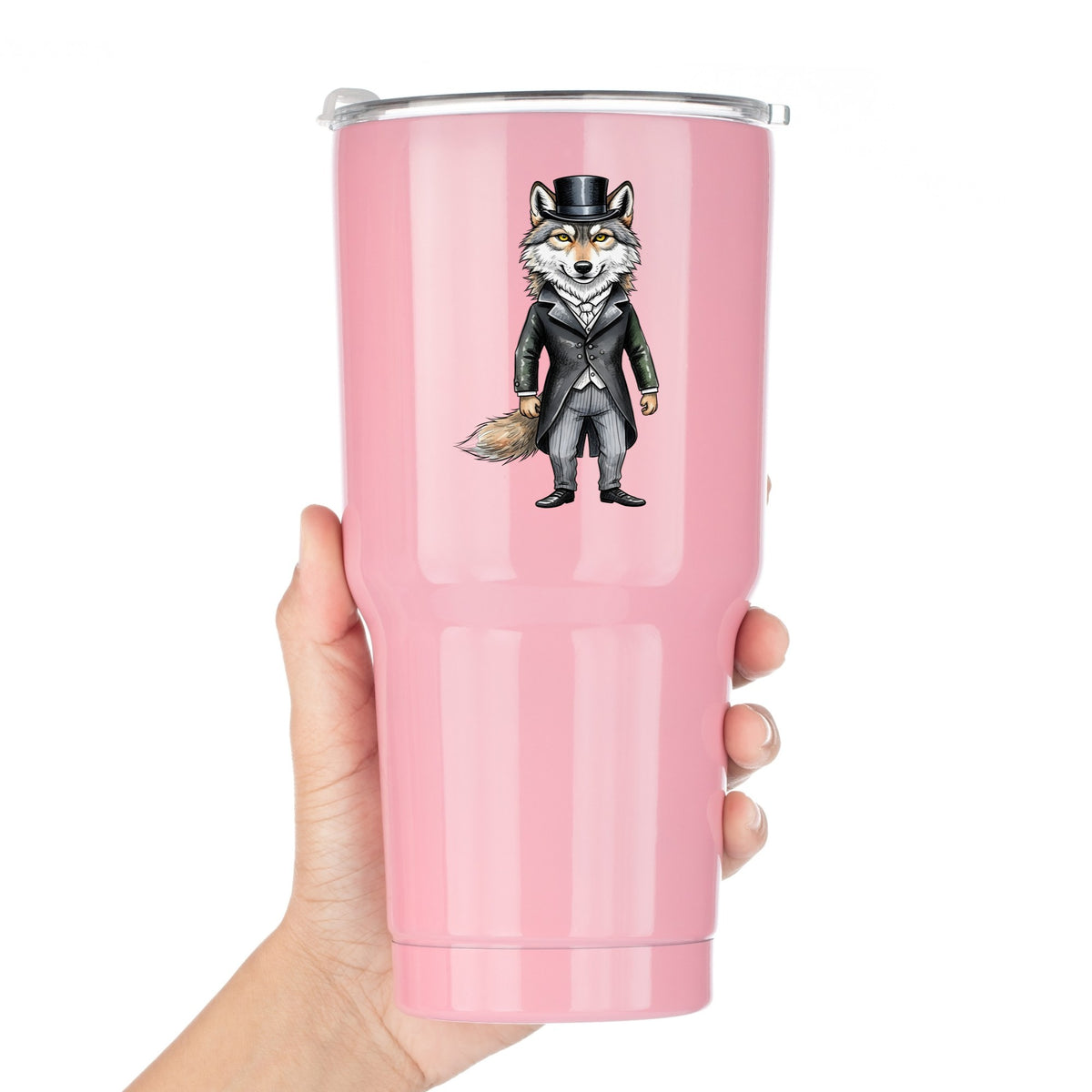 Gray Wolf Top Hat Tailcoat UV DTF sticker applied to a pink tumbler held against a white background
