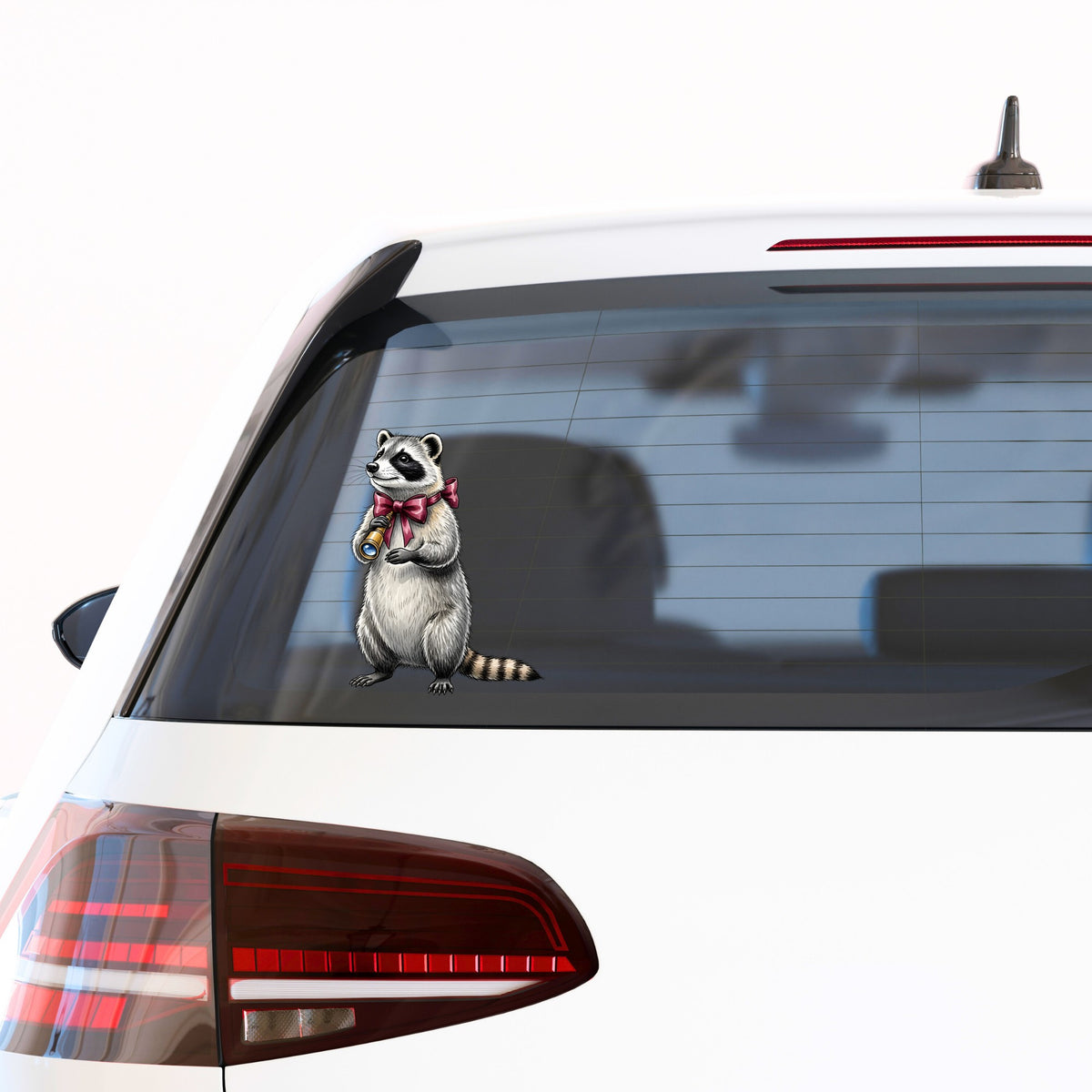 Raccoon With Spyglass Red Bow UV DTF sticker applied to the rear window of a white car