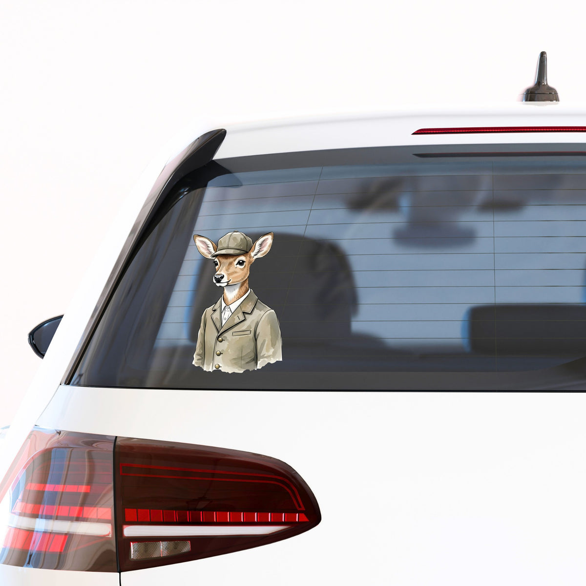 Deer In Tweed Cap Jacket UV DTF sticker applied to the rear window of a white car