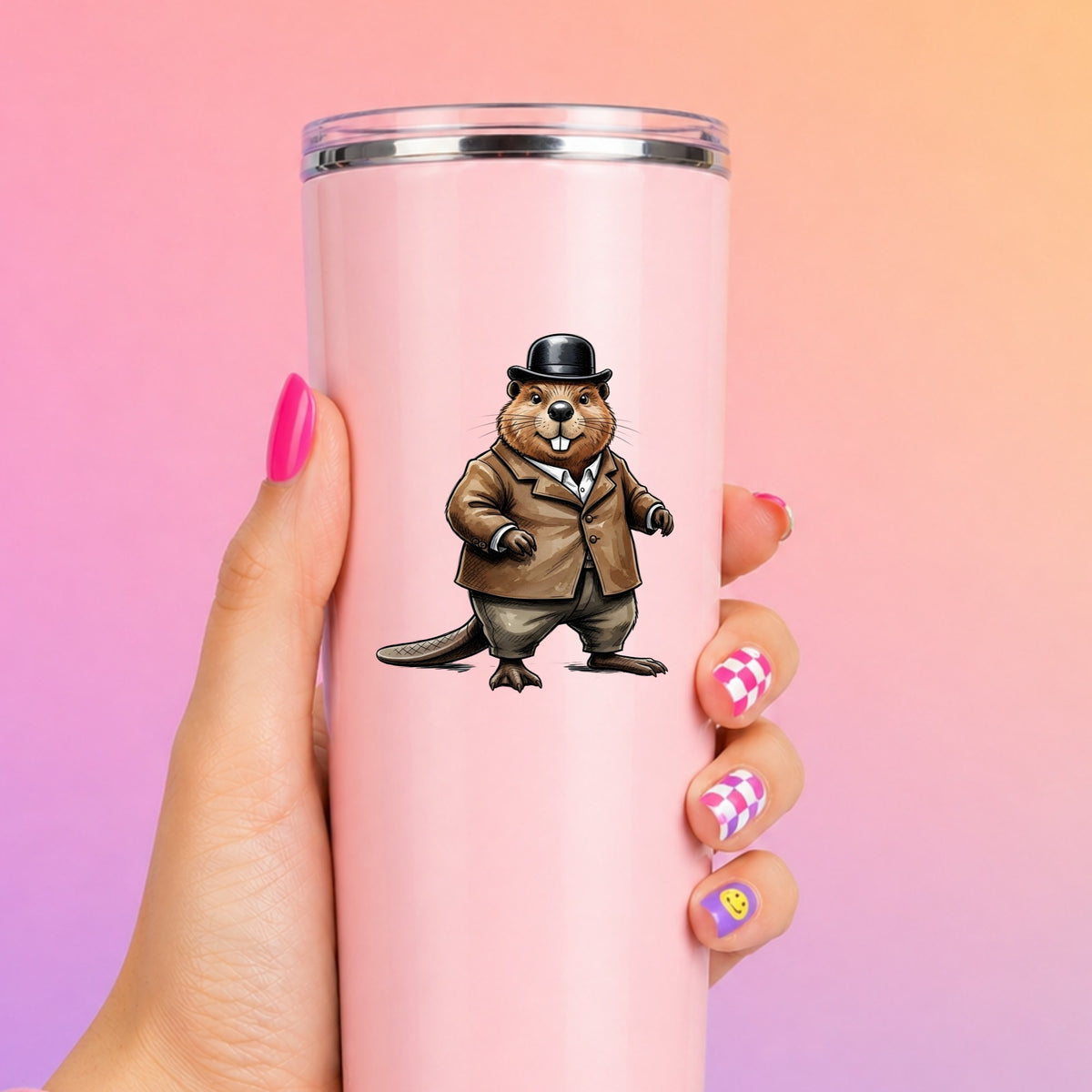 Beaver In Bowler Hat UV DTF sticker applied to a tall pink tumbler on a pink and orange background