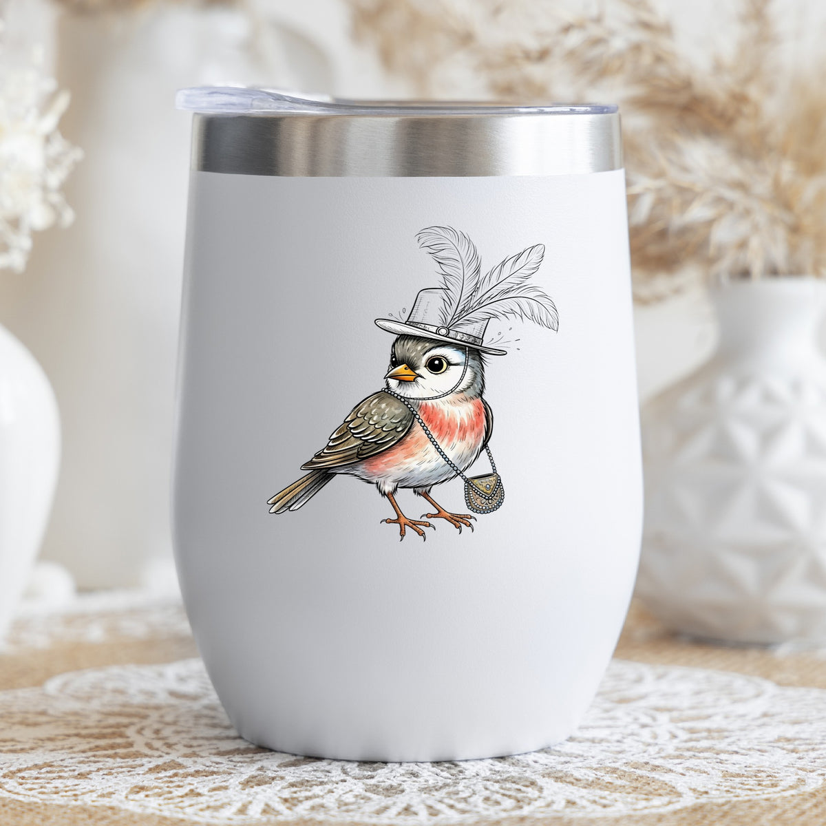 Fancy Bird Feather Hat Purse UV DTF sticker applied to a white stemless tumbler with a lid