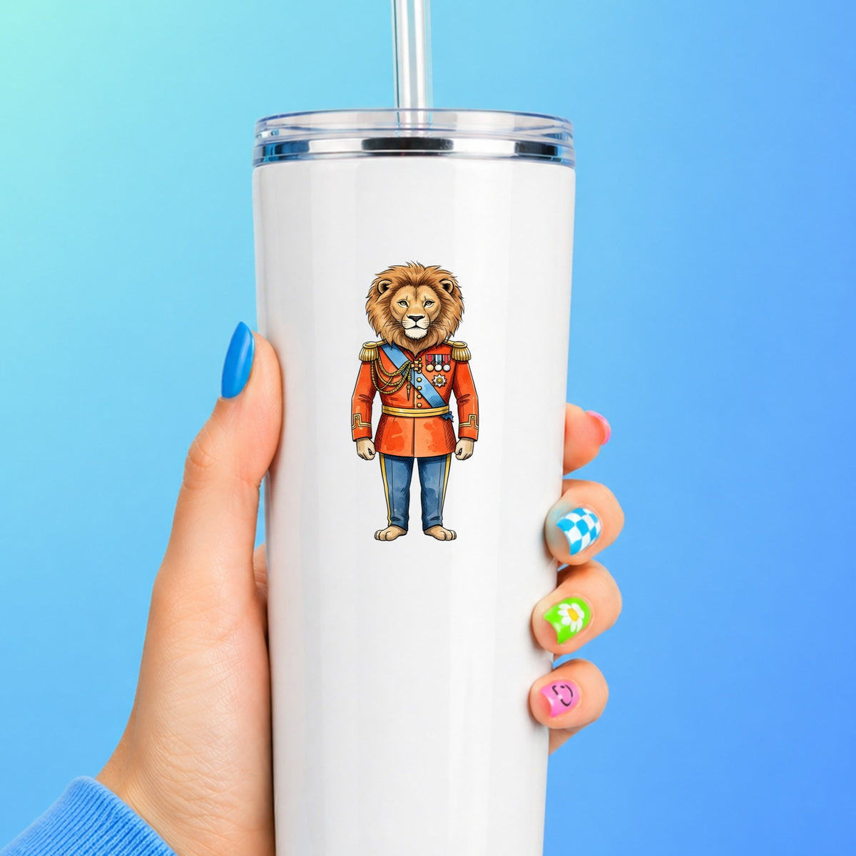 Lion Red Military Uniform UV DTF sticker applied to a white straw tumbler on a blue background