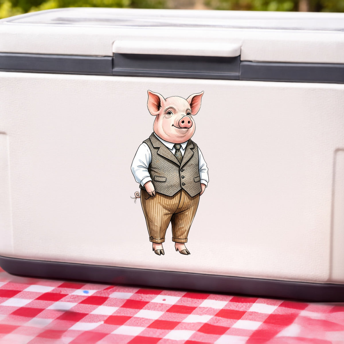 Pig In Tweed Vest UV DTF sticker applied to a white cooler on a red gingham cloth