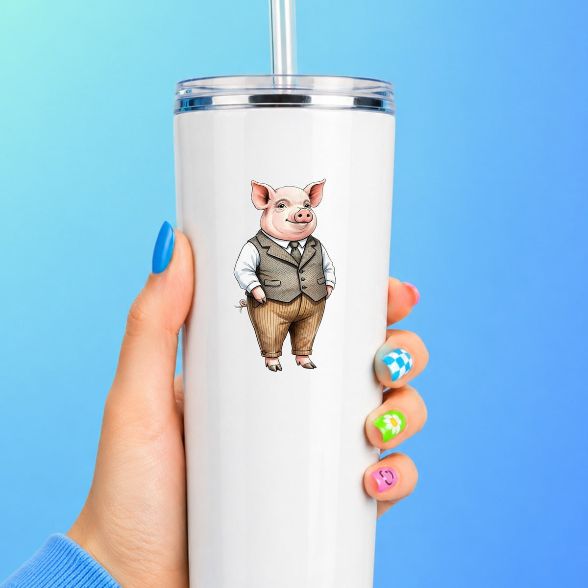 Pig In Tweed Vest UV DTF sticker applied to a white straw tumbler on a blue background