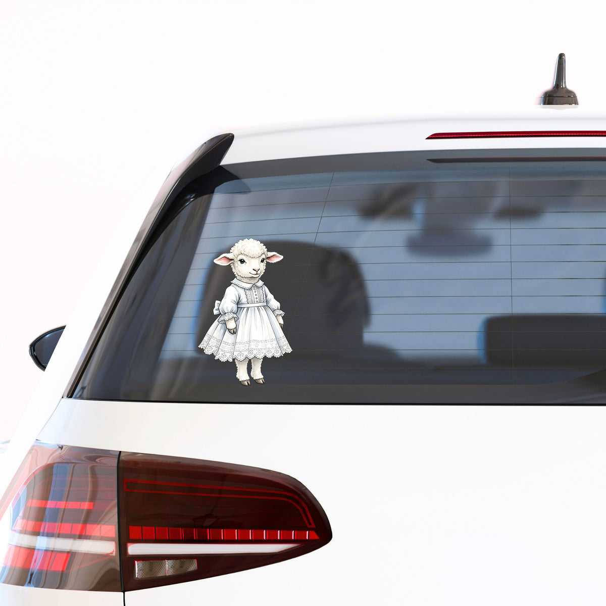 Lamb In White Lace Dress UV DTF sticker applied to the rear window of a white car