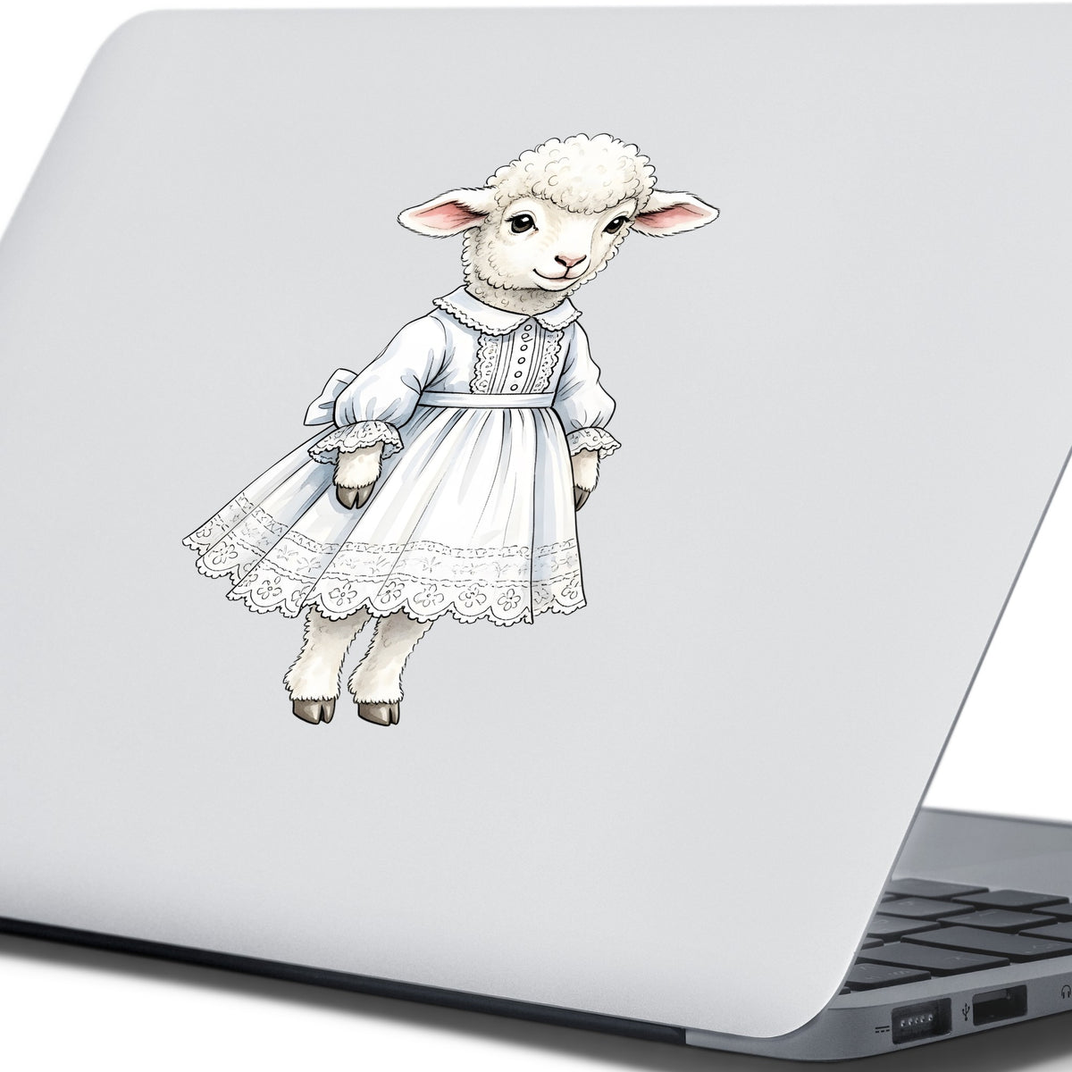 Lamb In White Lace Dress UV DTF sticker applied to the lid of a silver laptop
