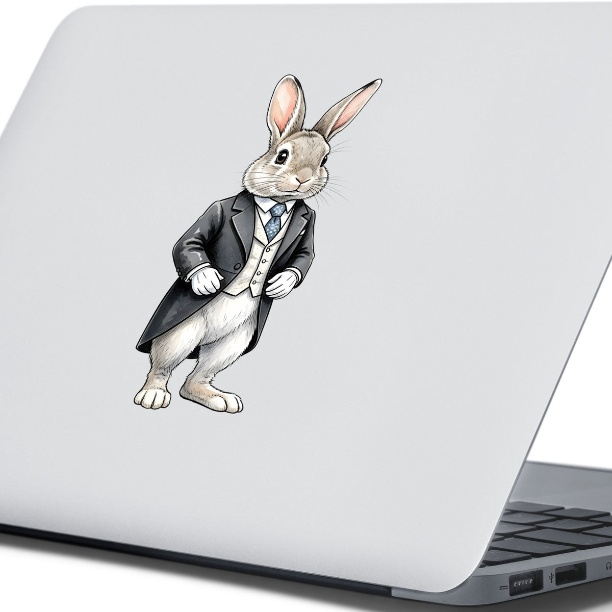 Rabbit Black Tailcoat Blue Tie UV DTF sticker applied to the lid of a silver laptop