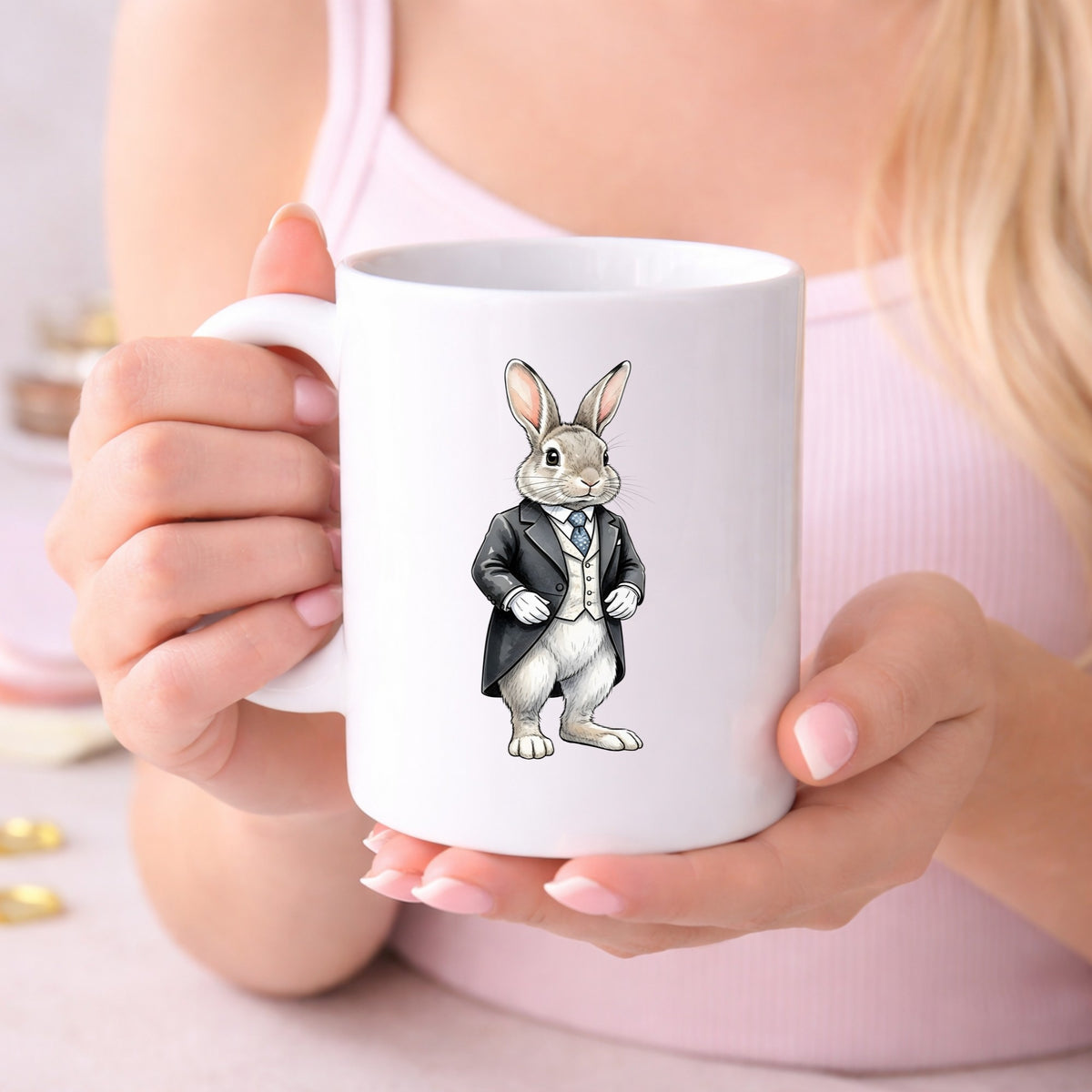Rabbit Black Tailcoat Blue Tie UV DTF sticker applied to a white coffee mug held in both hands
