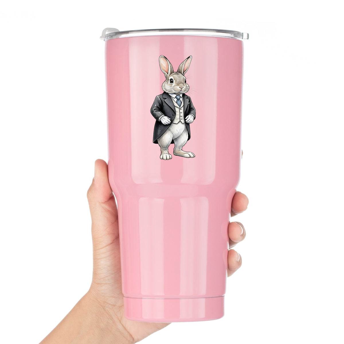 Rabbit Black Tailcoat Blue Tie UV DTF sticker applied to a pink tumbler held against a white background
