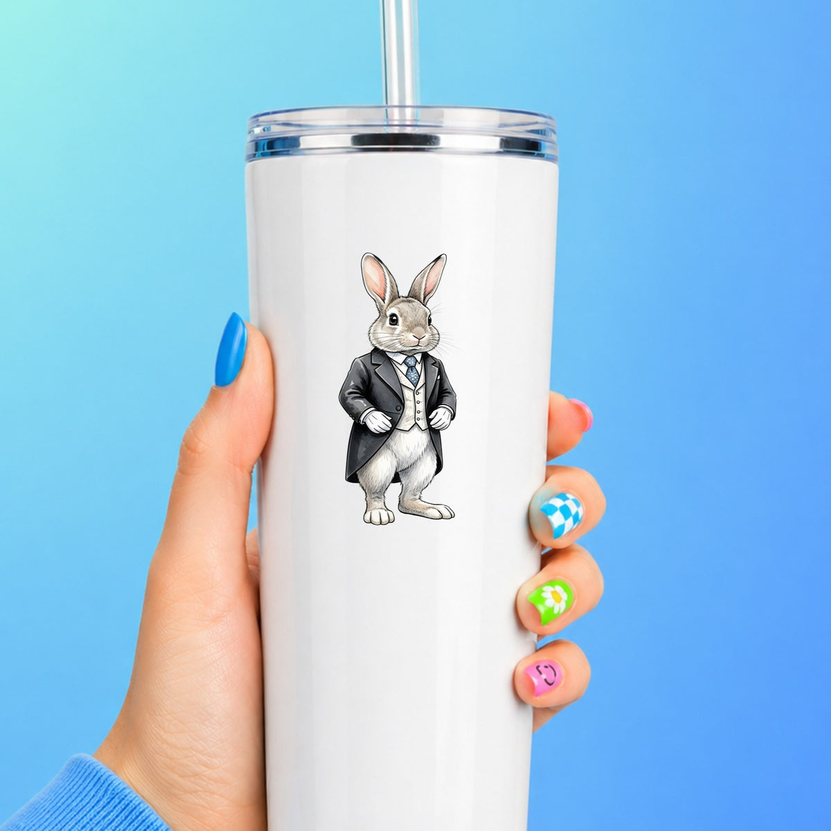 Rabbit Black Tailcoat Blue Tie UV DTF sticker applied to a white straw tumbler on a blue background