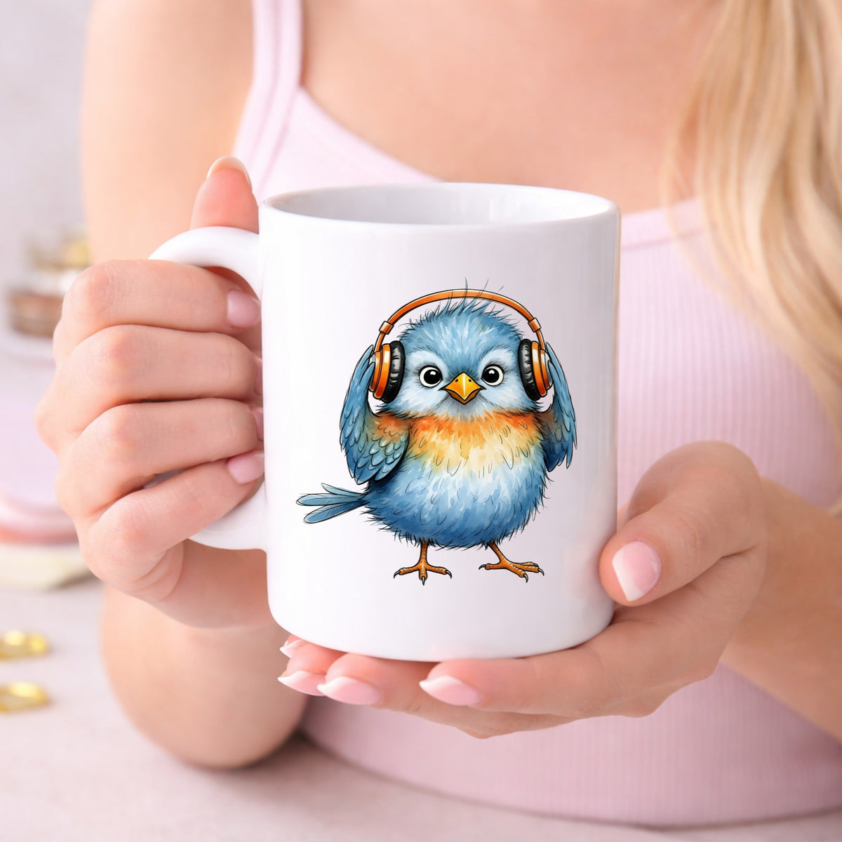 Blue Bird With Headphones UV DTF sticker applied to a white coffee mug held in both hands