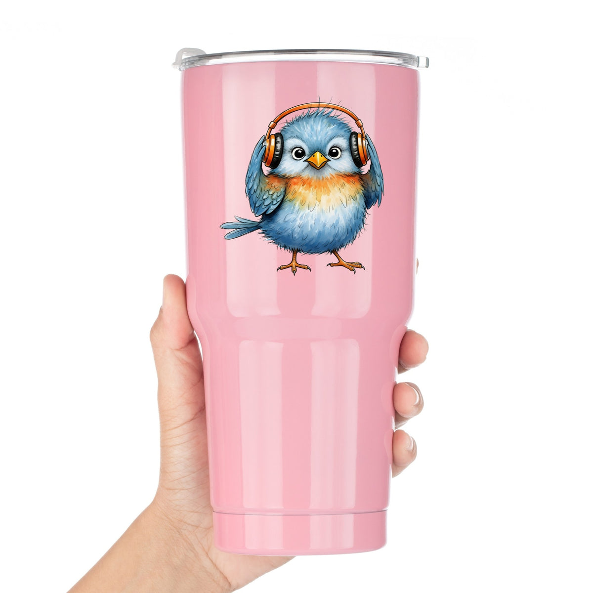 Blue Bird With Headphones UV DTF sticker applied to a pink tumbler held against a white background