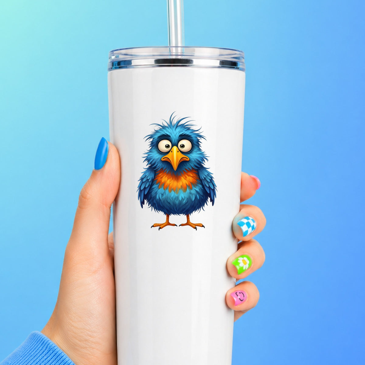 Wide Eyed Shaggy Blue Bird UV DTF sticker applied to a white straw tumbler on a blue background