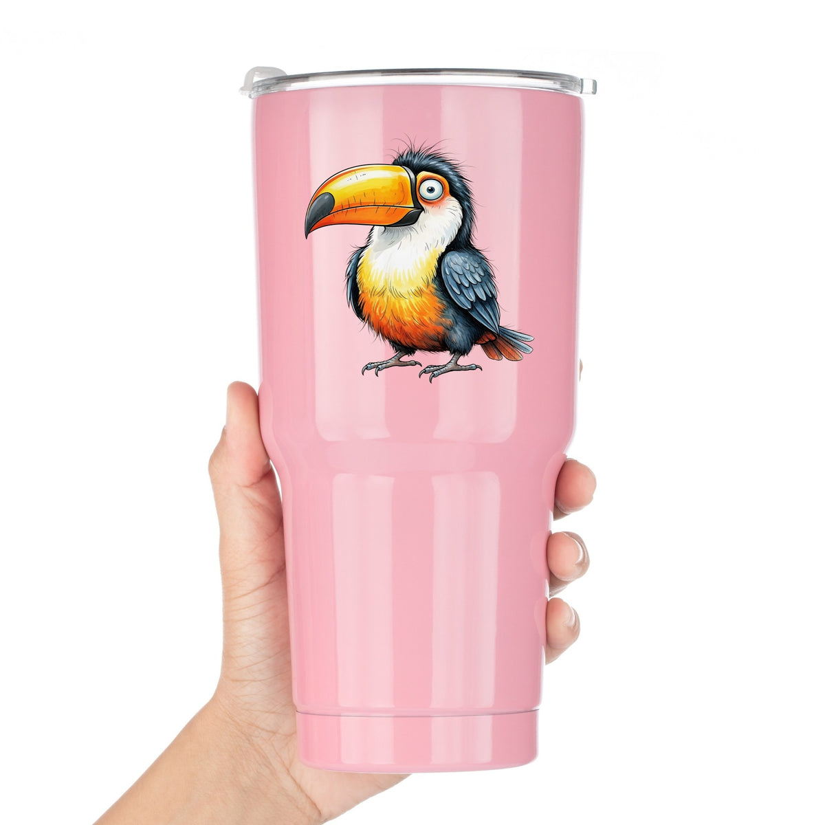 Toucan Big Orange Beak UV DTF sticker applied to a pink tumbler held against a white background