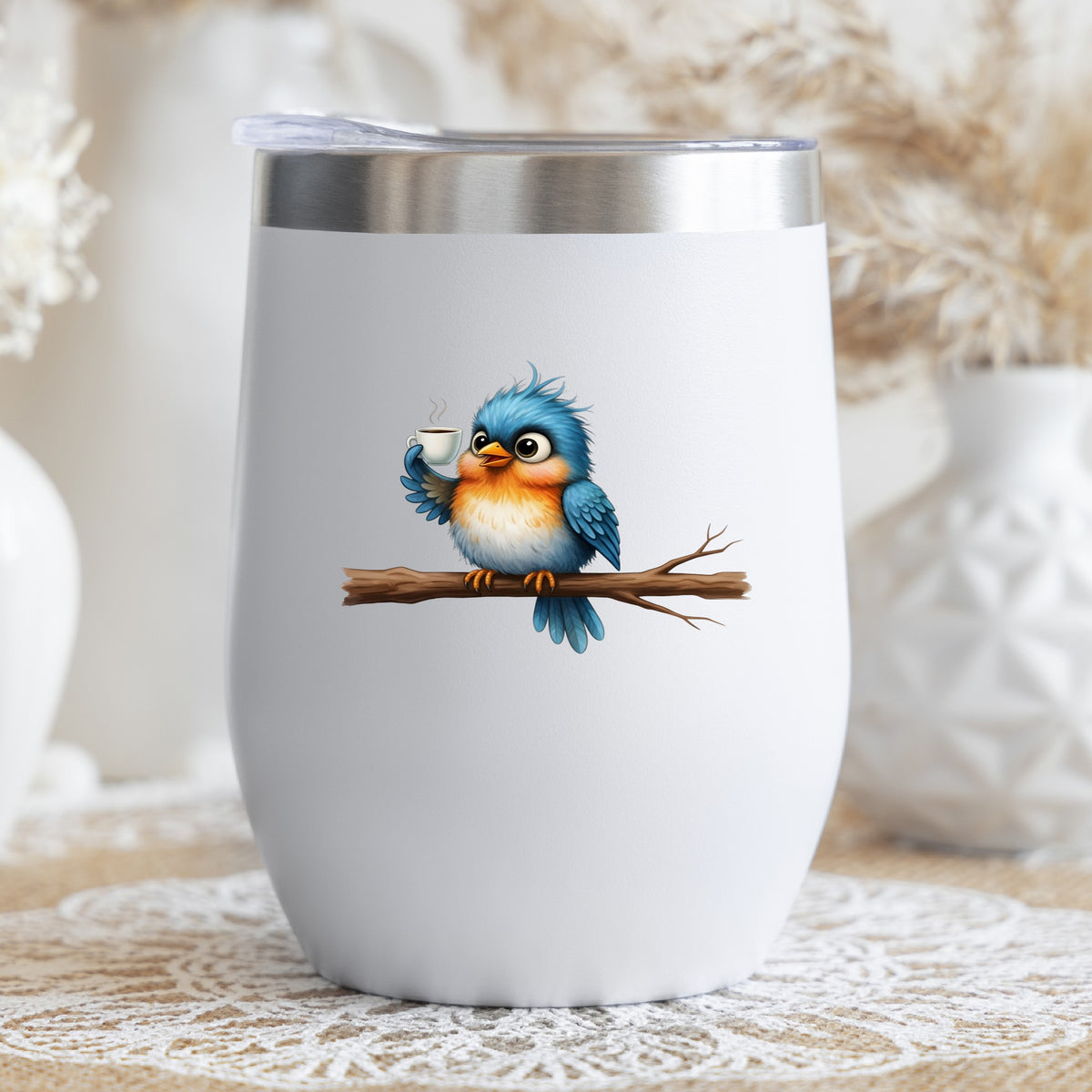 Bird Drinking Coffee On Branch UV DTF sticker applied to a white stemless tumbler with a lid