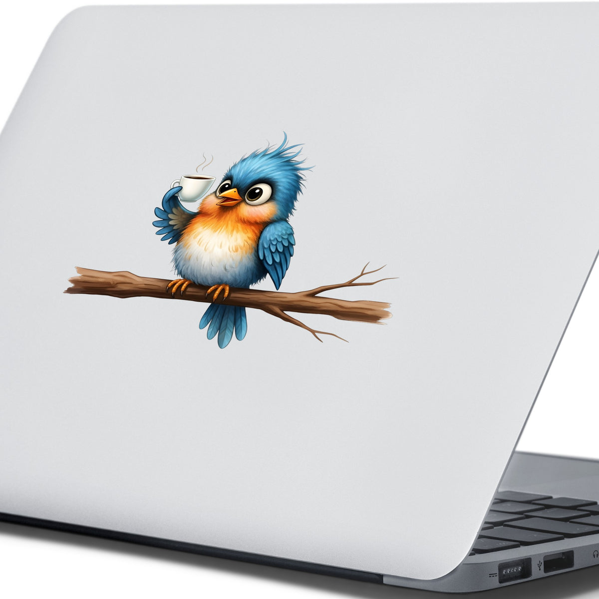 Bird Drinking Coffee On Branch UV DTF sticker applied to the lid of a silver laptop