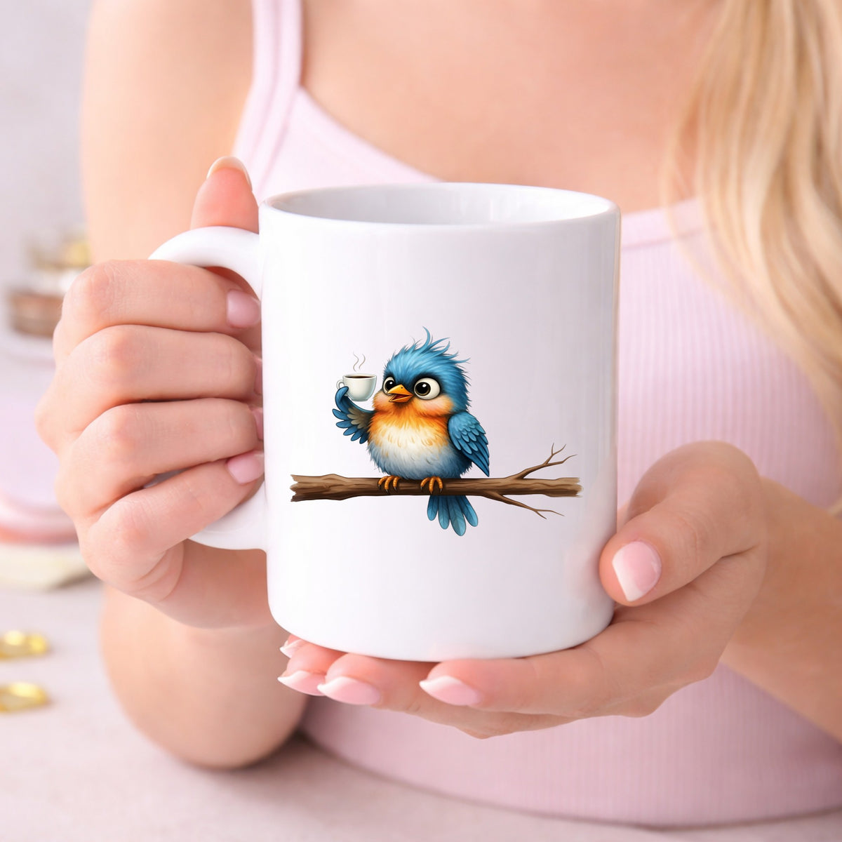 Bird Drinking Coffee On Branch UV DTF sticker applied to a white coffee mug held in both hands