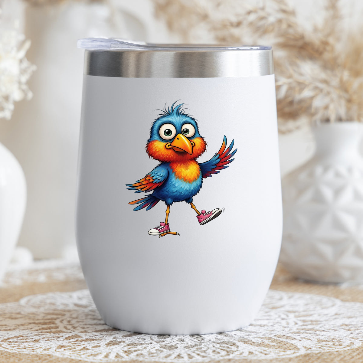 Bird In Pink Sneakers UV DTF sticker applied to a white stemless tumbler with a lid