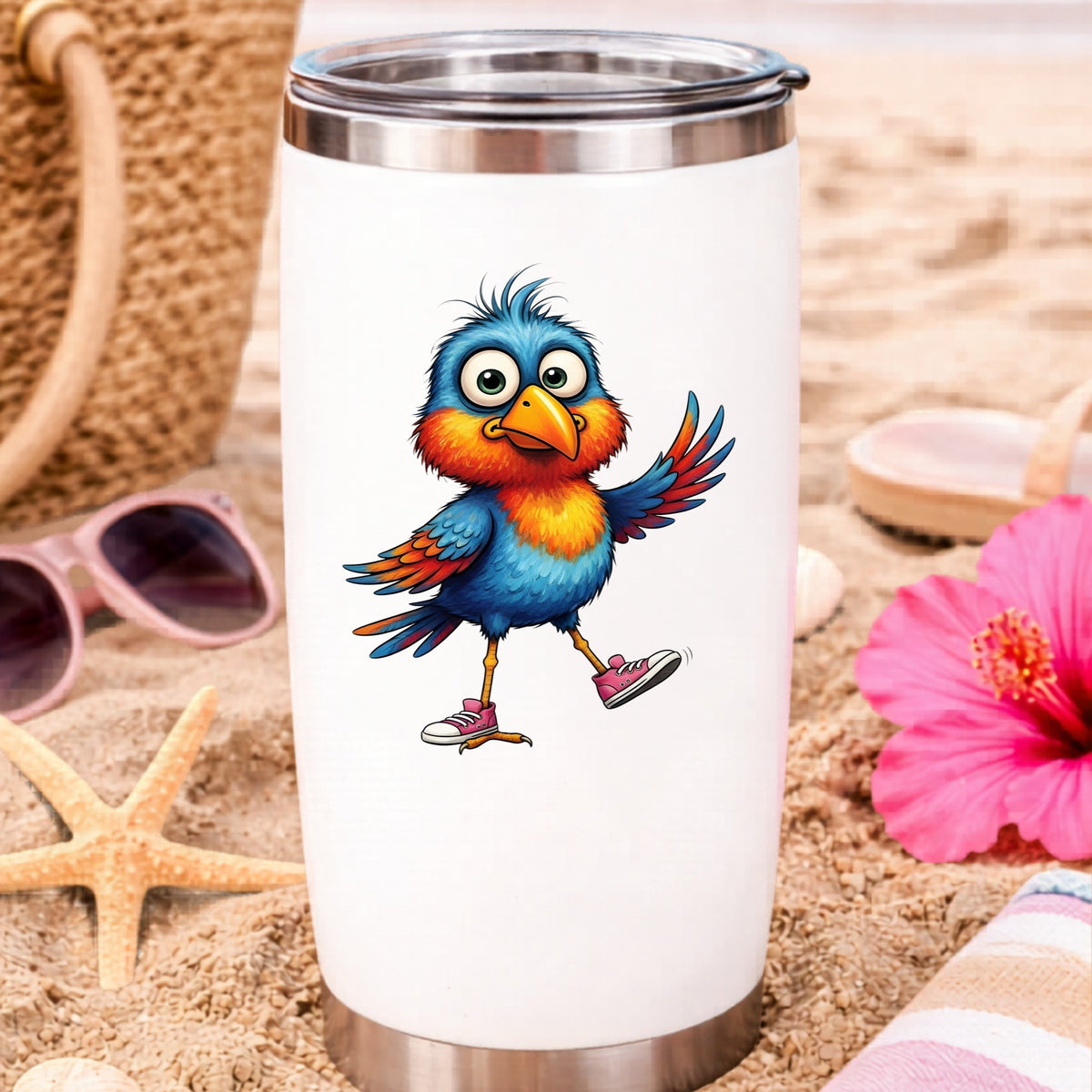 Bird In Pink Sneakers UV DTF sticker applied to a white travel tumbler on beach sand