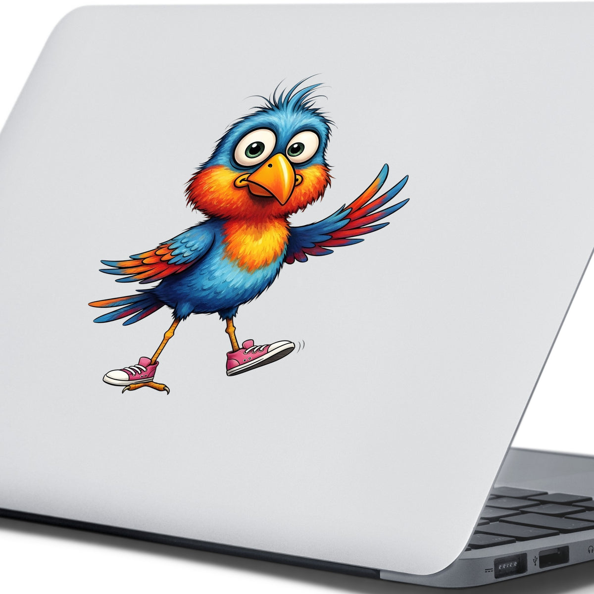 Bird In Pink Sneakers UV DTF sticker applied to the lid of a silver laptop