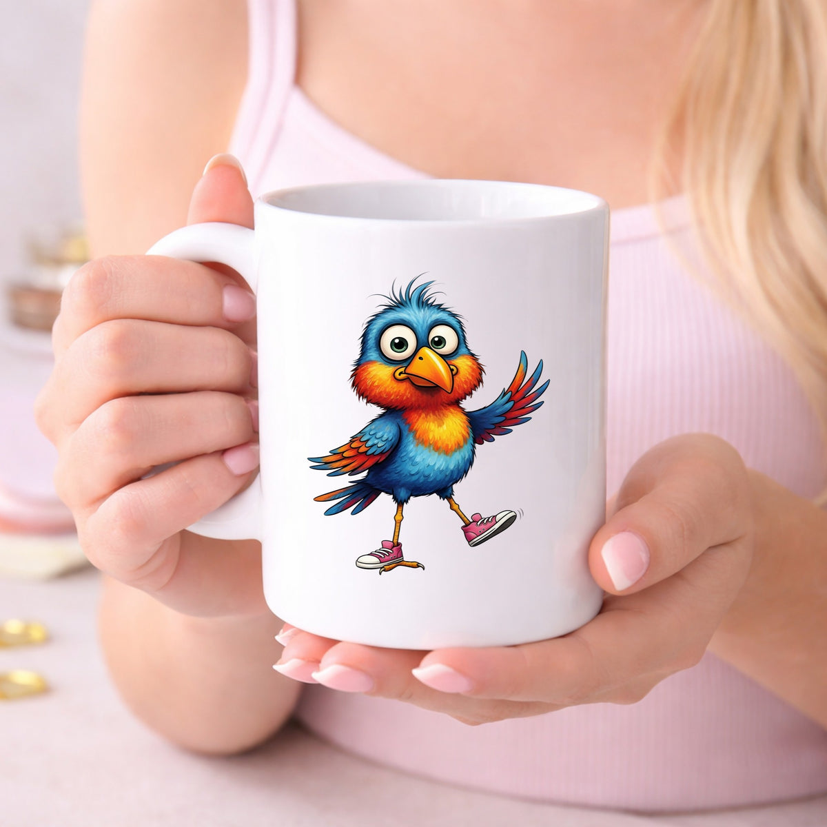 Bird In Pink Sneakers UV DTF sticker applied to a white coffee mug held in both hands