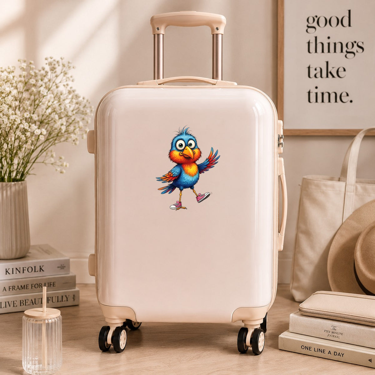 Bird In Pink Sneakers UV DTF sticker applied to a cream carry-on suitcase