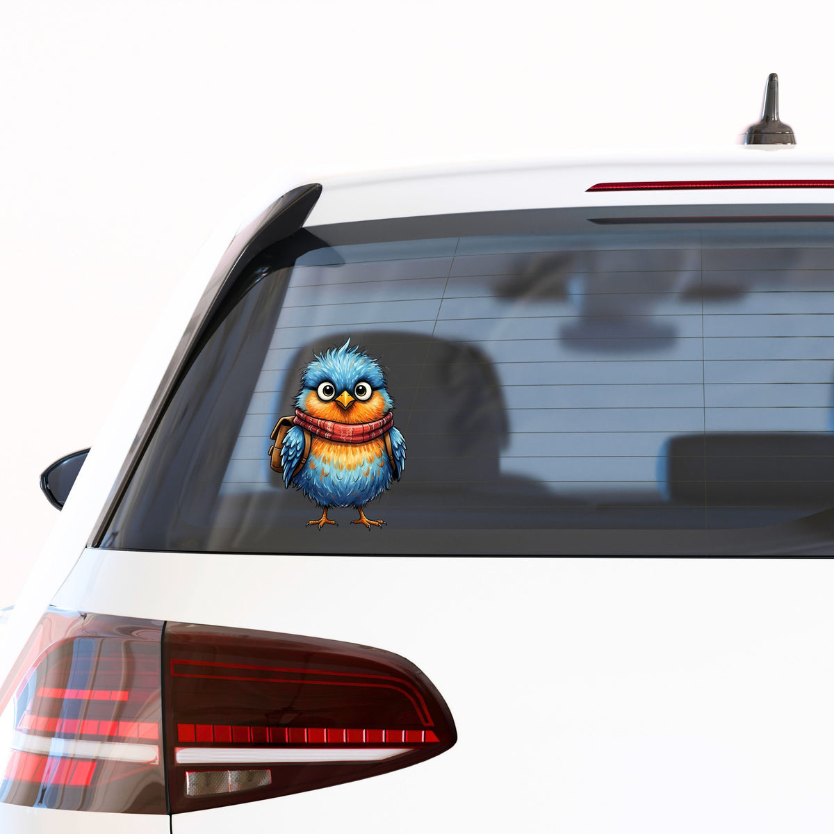 Bird With Red Scarf And Backpack UV DTF sticker applied to the rear window of a white car
