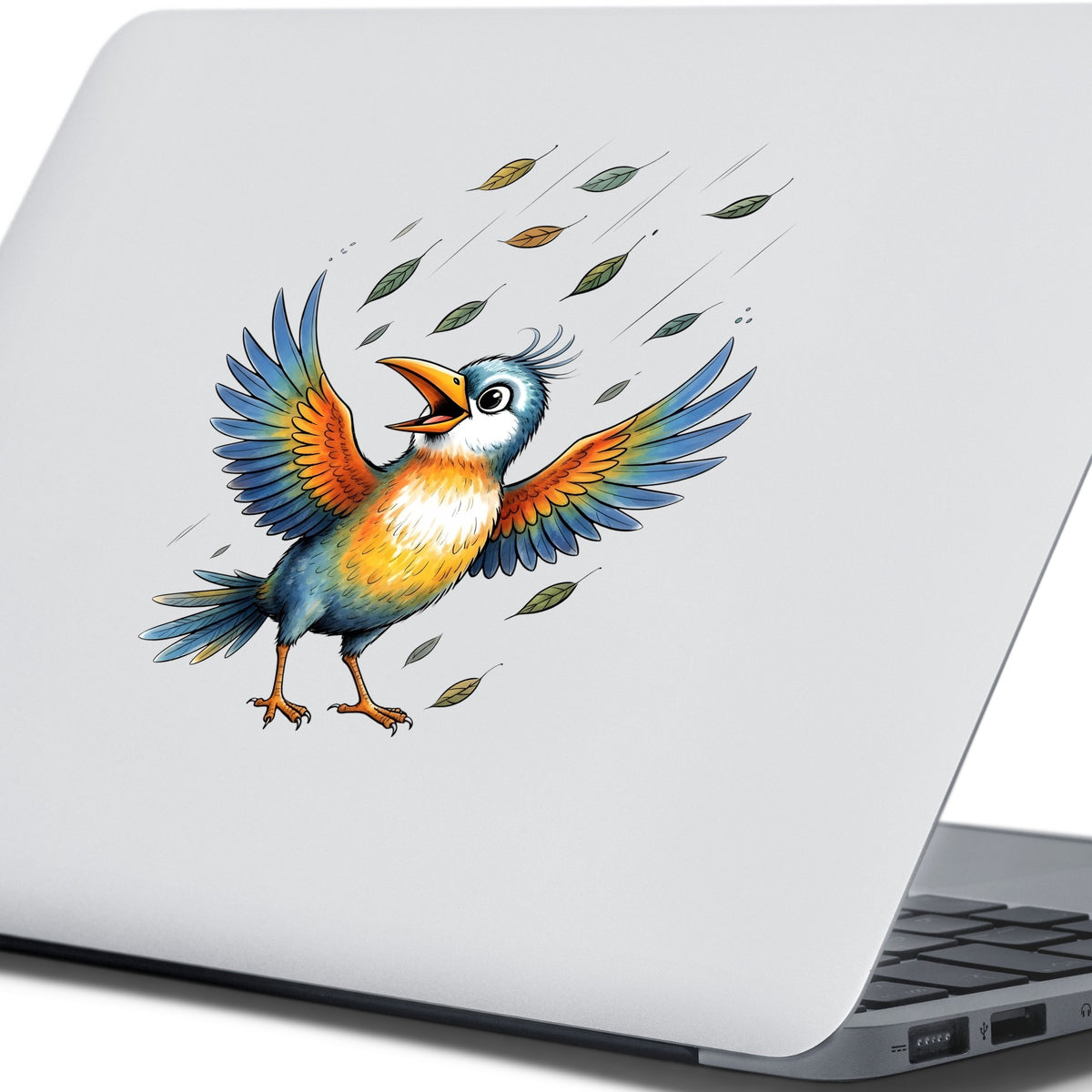 Happy Bird Wings Spread Falling Leaves UV DTF sticker applied to the lid of a silver laptop
