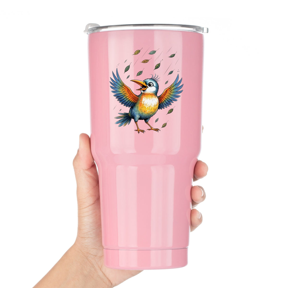 Happy Bird Wings Spread Falling Leaves UV DTF sticker applied to a pink tumbler held against a white background