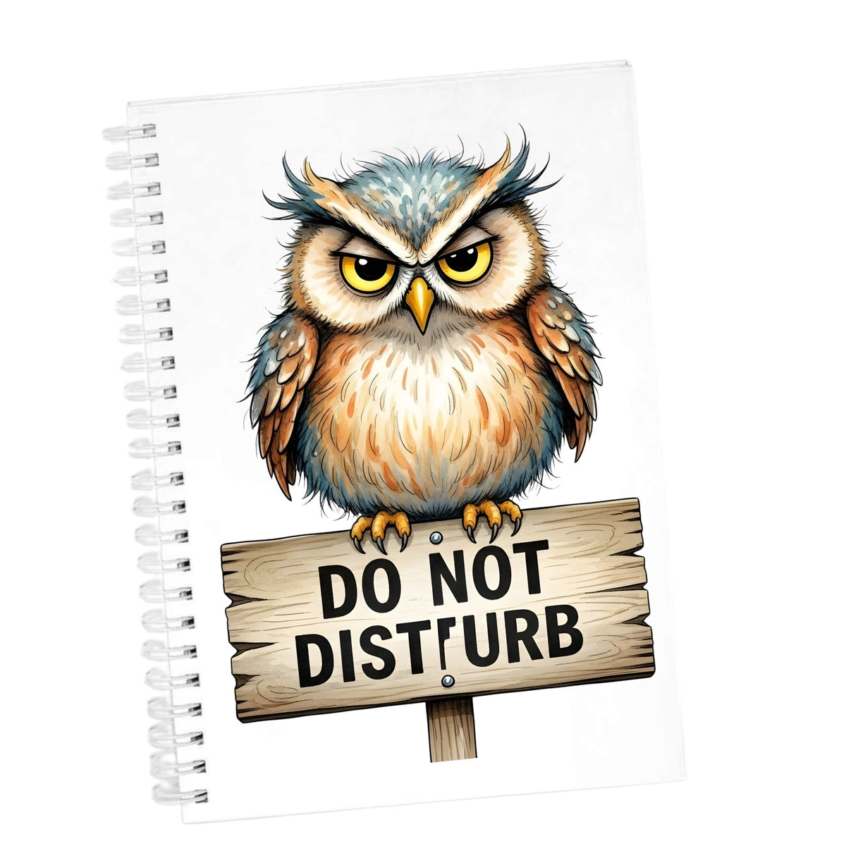 Grumpy Owl Do Not Disturb Sign UV DTF sticker applied to the cover of a white spiral journal